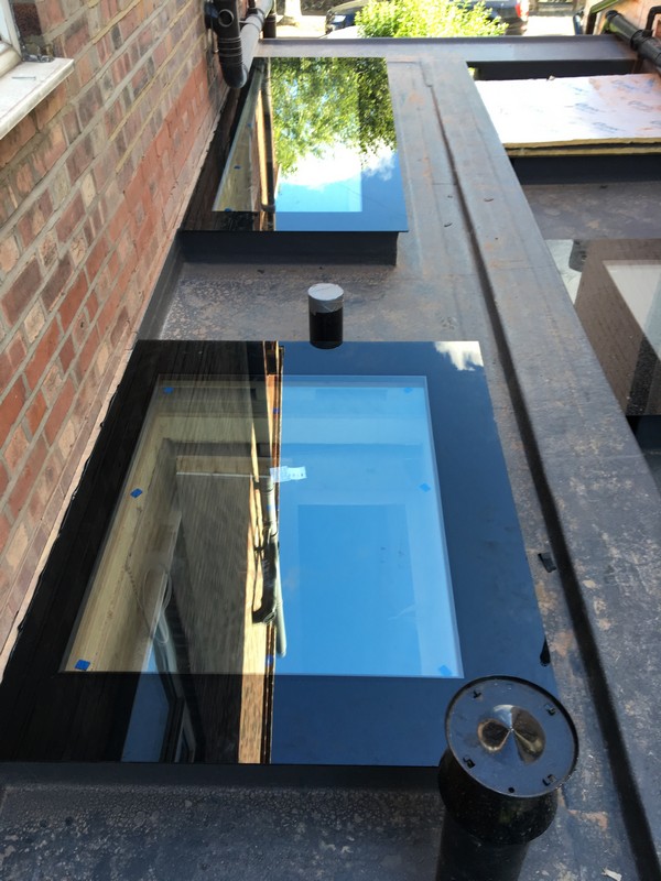 Multiple flat roof skylights on extension in Bayswater